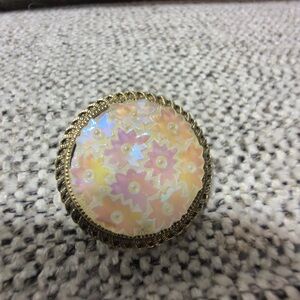 vintage West Germany gold-tone iridescent flower scarf clip.